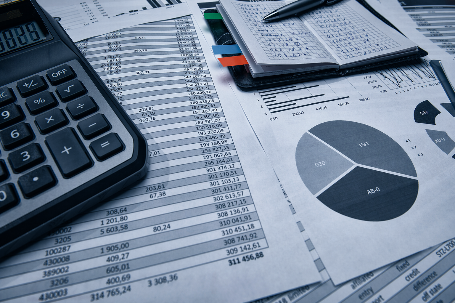 Tax wage garnishment documents and calculator on desk representing IRS debt relief services in Arlington