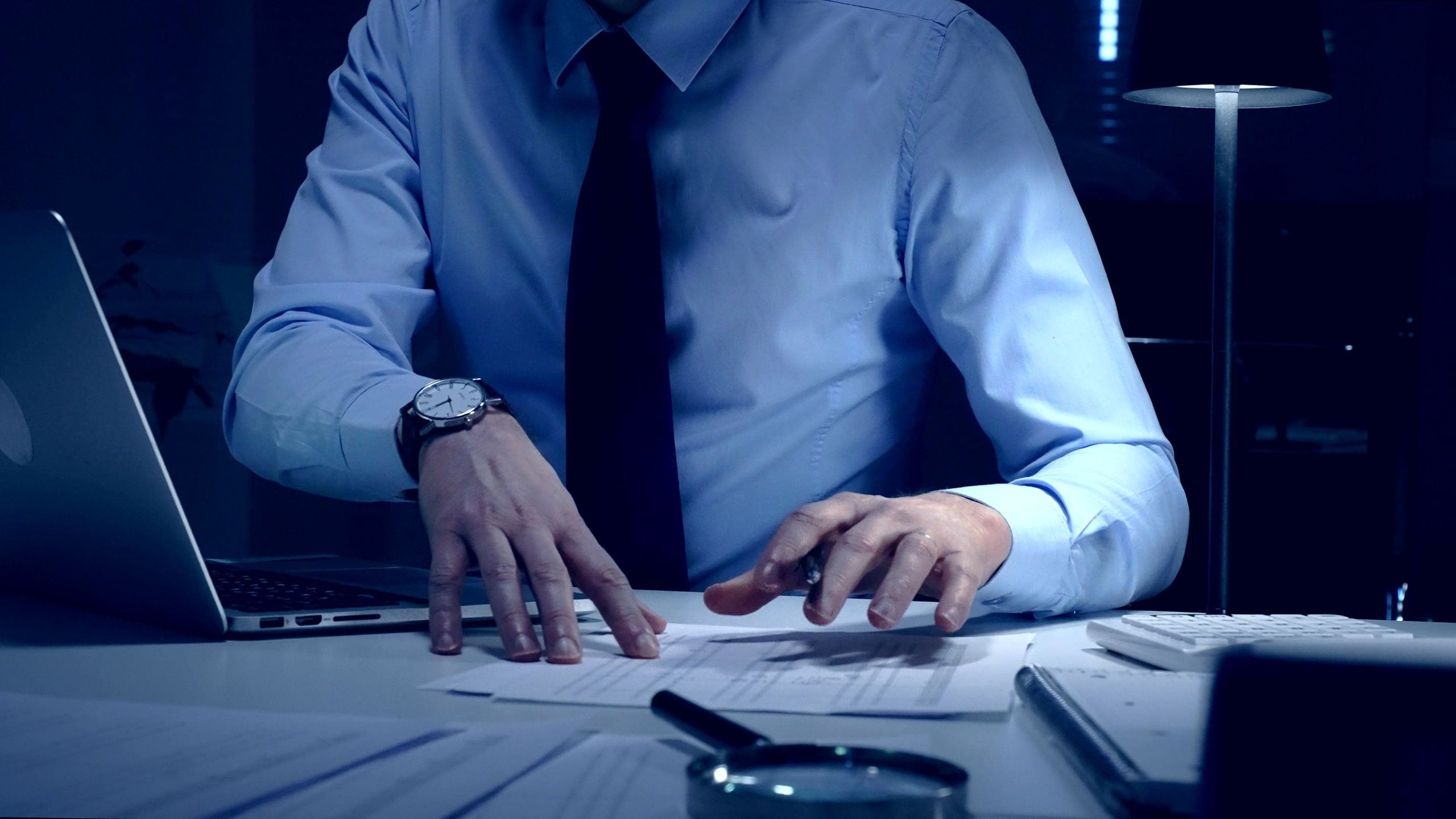 Tax agreement contract being signed on desk for IRS debt relief services in Orlando