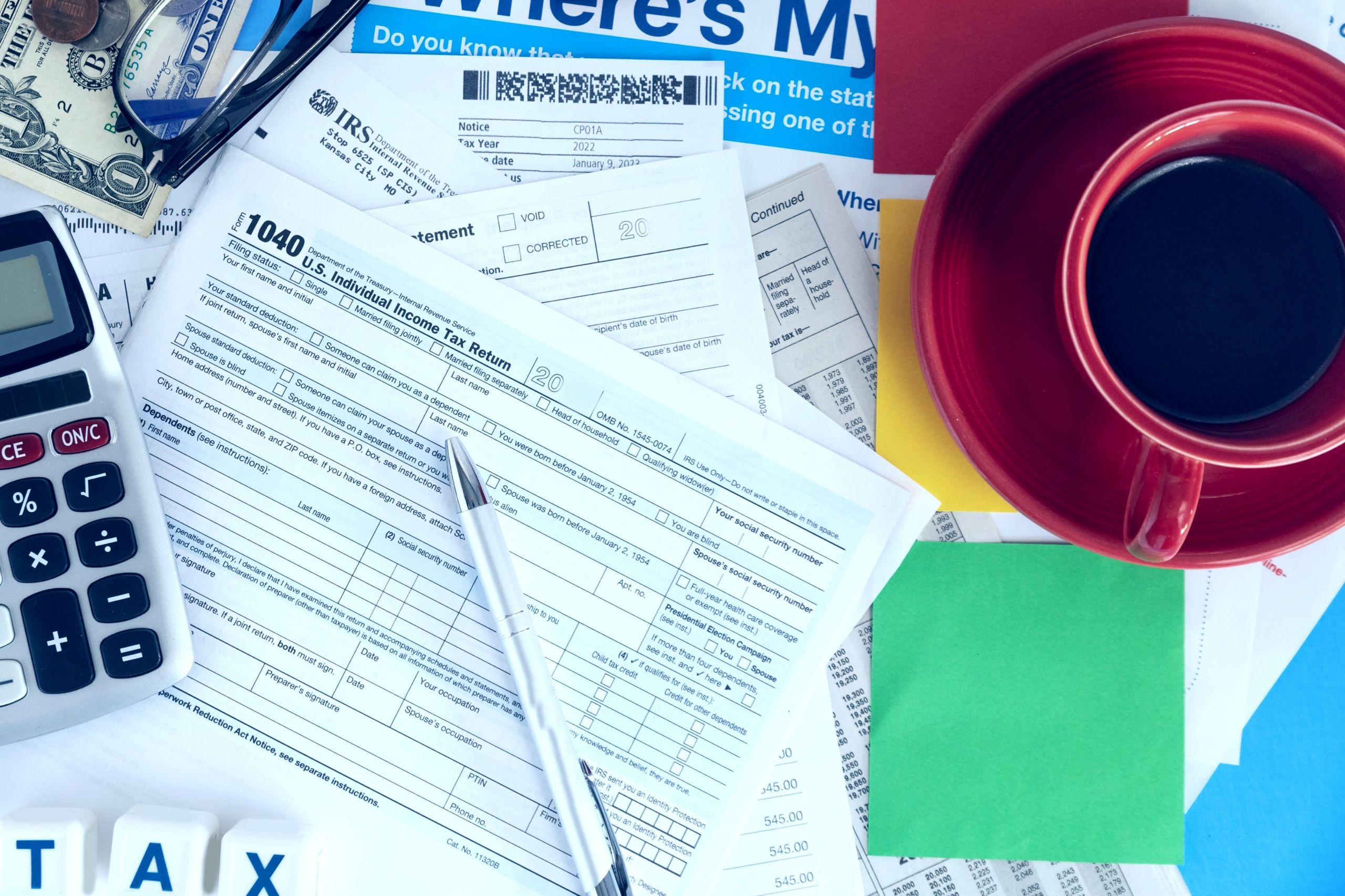 Tax resolution documents on desk representing IRS debt relief services in Port St. Lucie