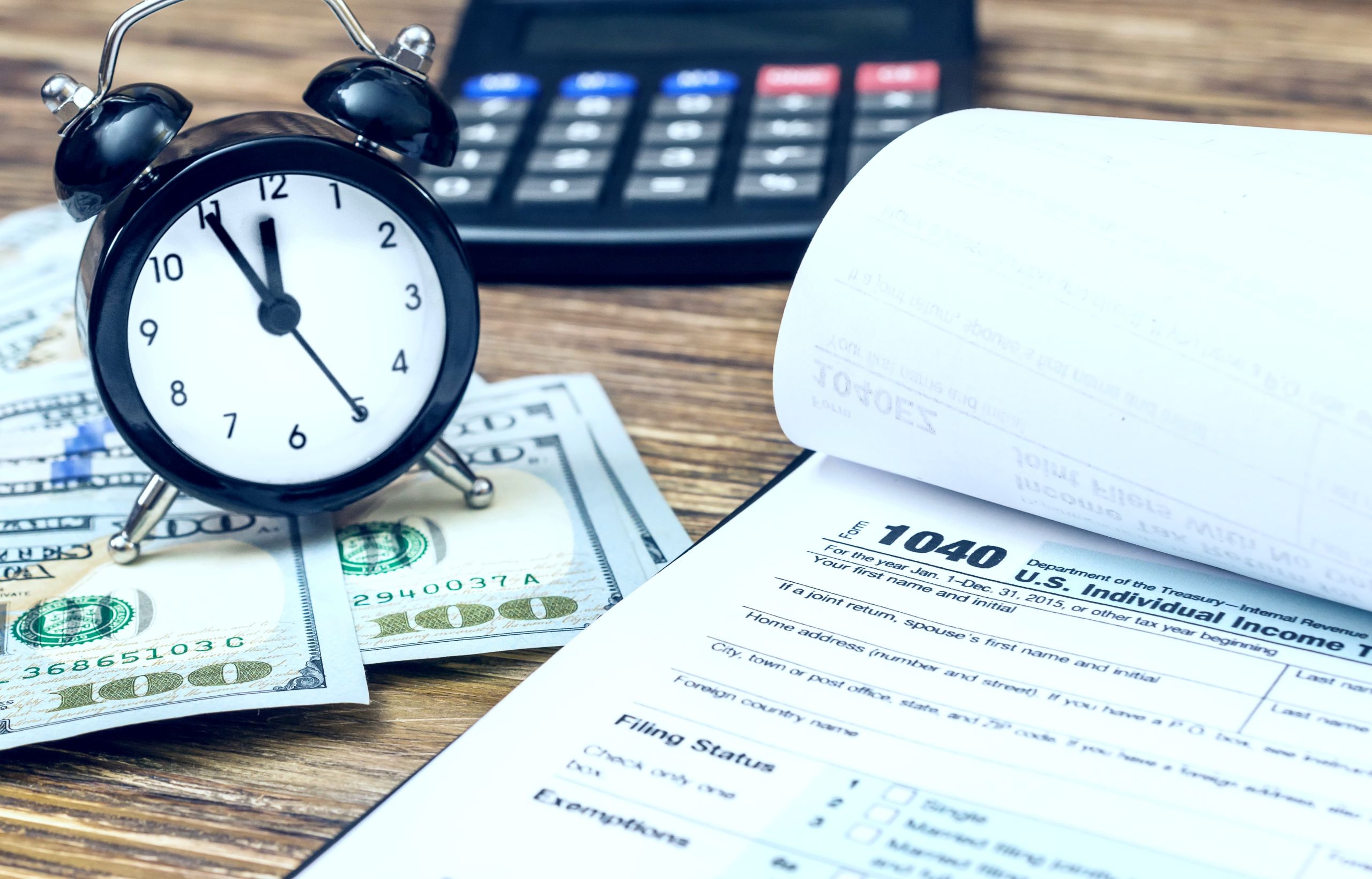 Tax debt settlement documents on desk representing IRS debt relief services in Houston