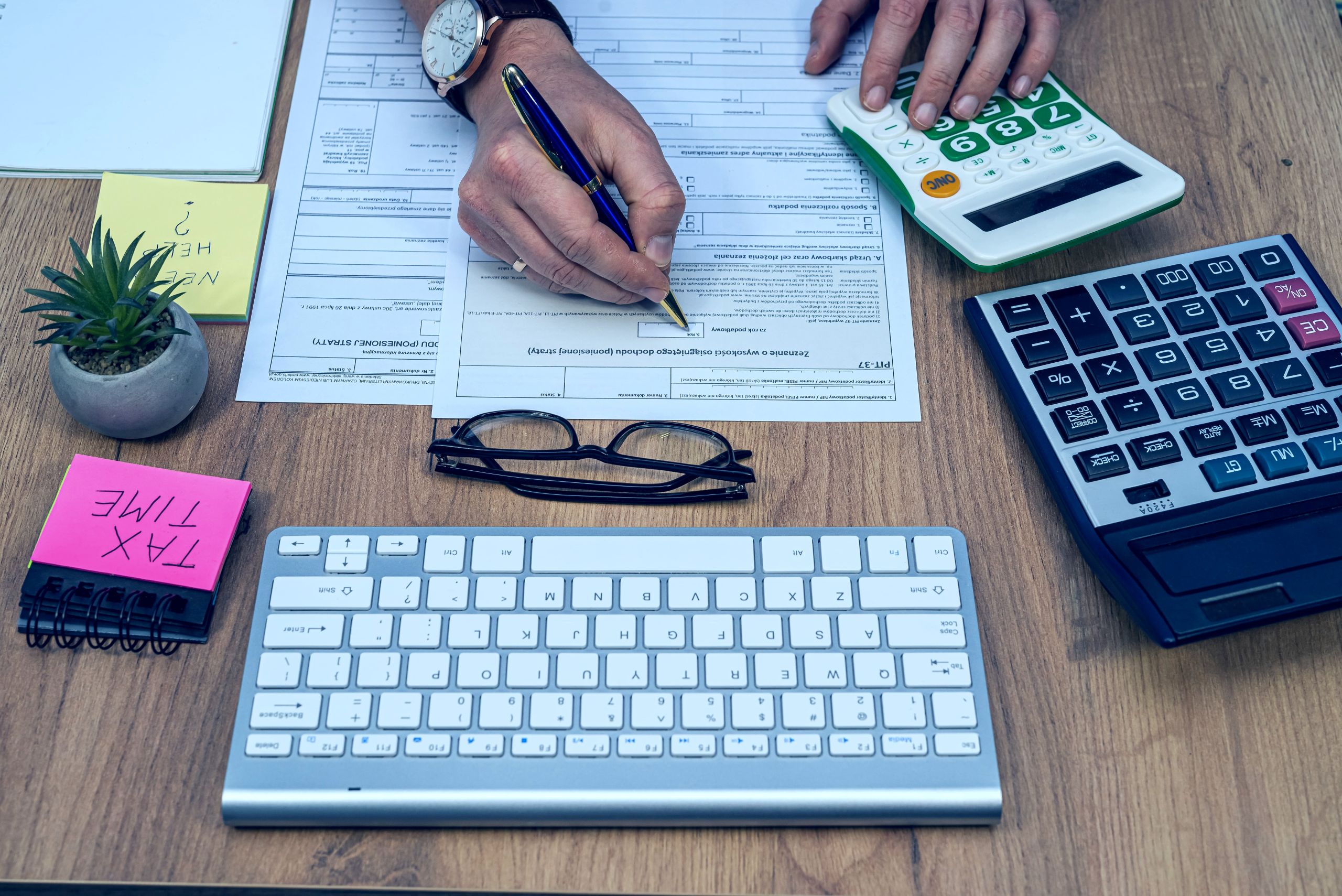 Tax law notebook and pen on desk representing IRS debt relief services in Miami