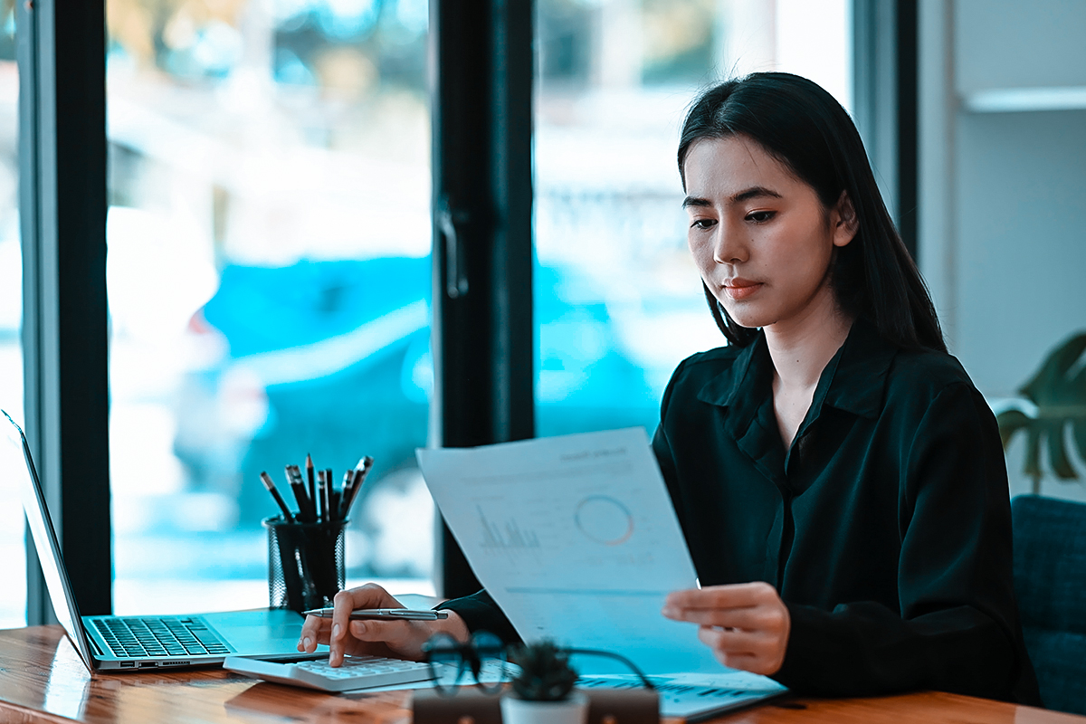 Businesswoman reviewing IRS Fresh Start Program options with a tax professional in Yonkers