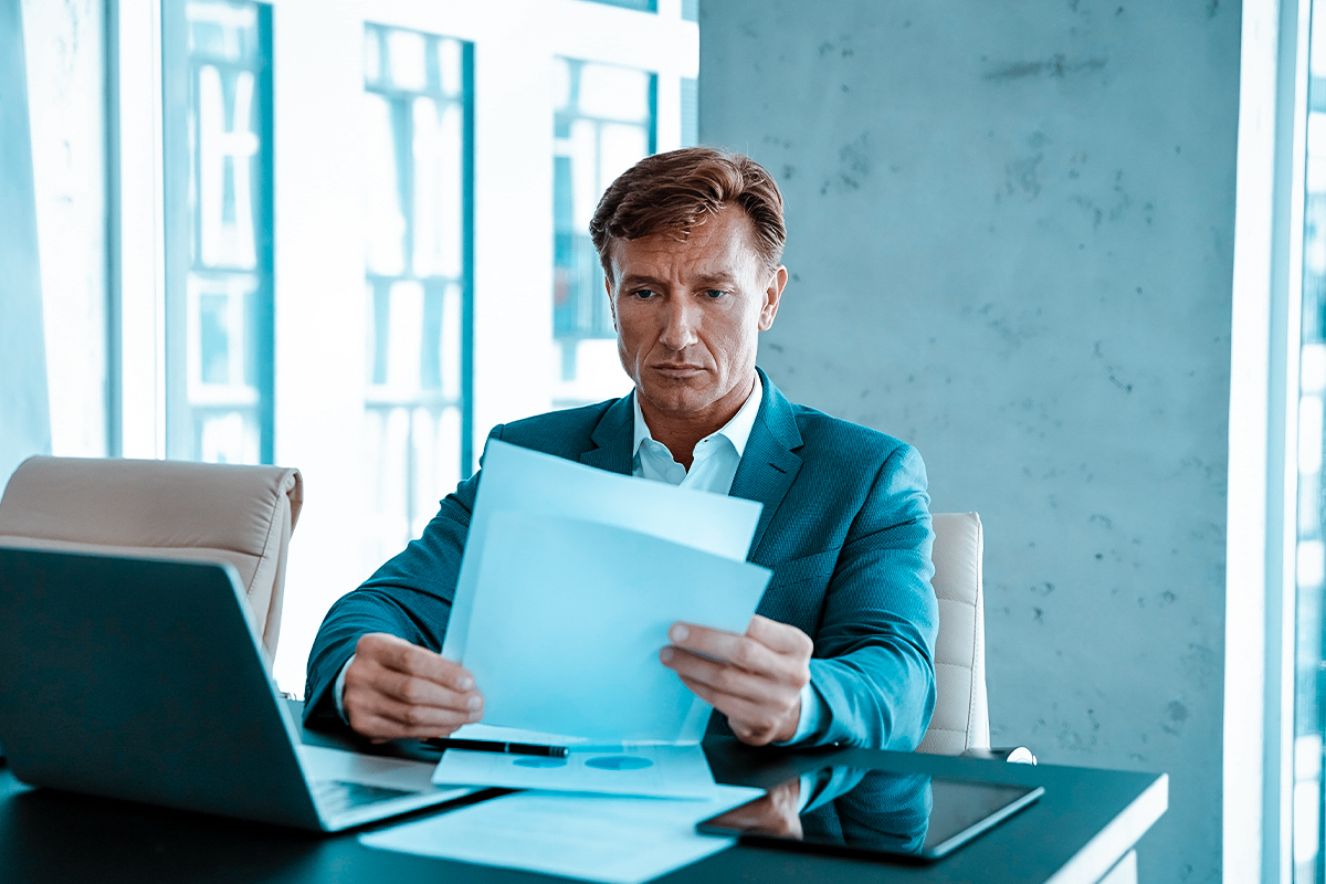 Man reviewing IRS Fresh Start Program options with a tax professional in Buffalo