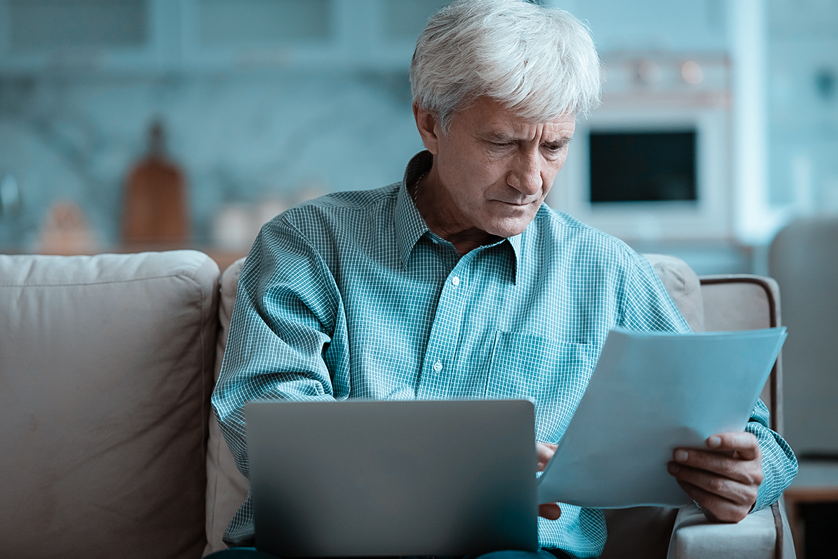 Senior professional reviewing IRS Fresh Start Program options with a tax attorney in Rochester