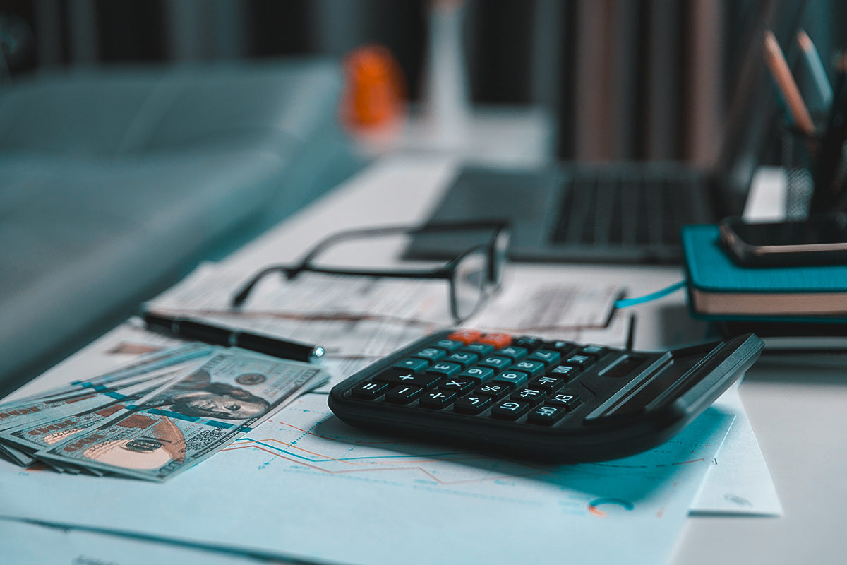 IRS tax form and pen on desk for tax debt relief services
