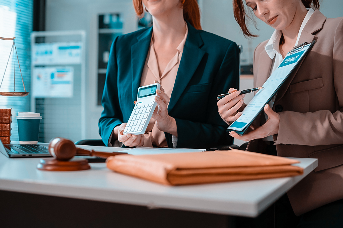 Woman reviewing IRS Fresh Start Program options with a tax professional in New York City