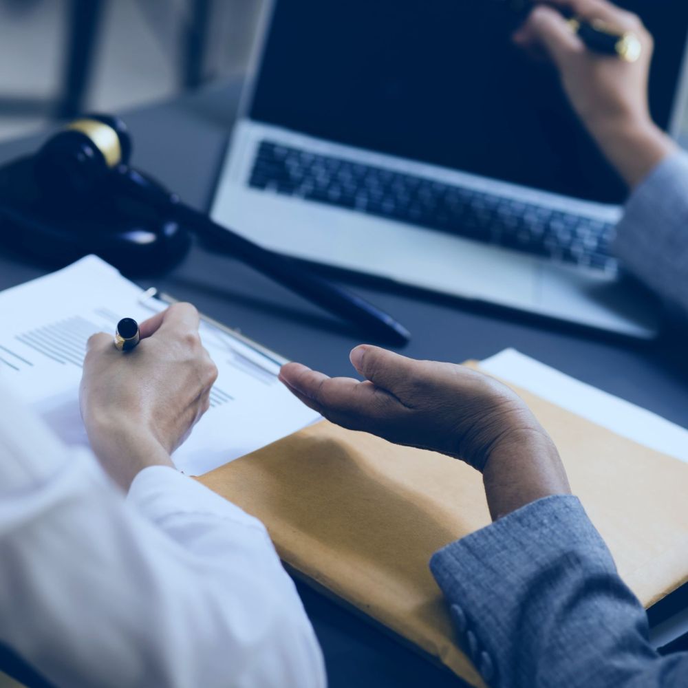 Tax attorney meeting with client in Cape Coral to discuss IRS debt relief options