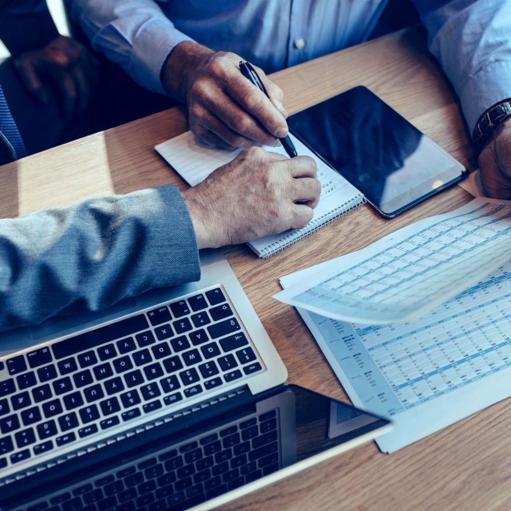 Tax attorney reviewing IRS debt relief options with client in Port St. Lucie