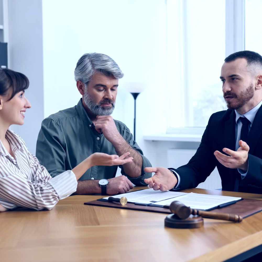 Tax attorney reviewing IRS debt relief options with client in Port St. Lucie