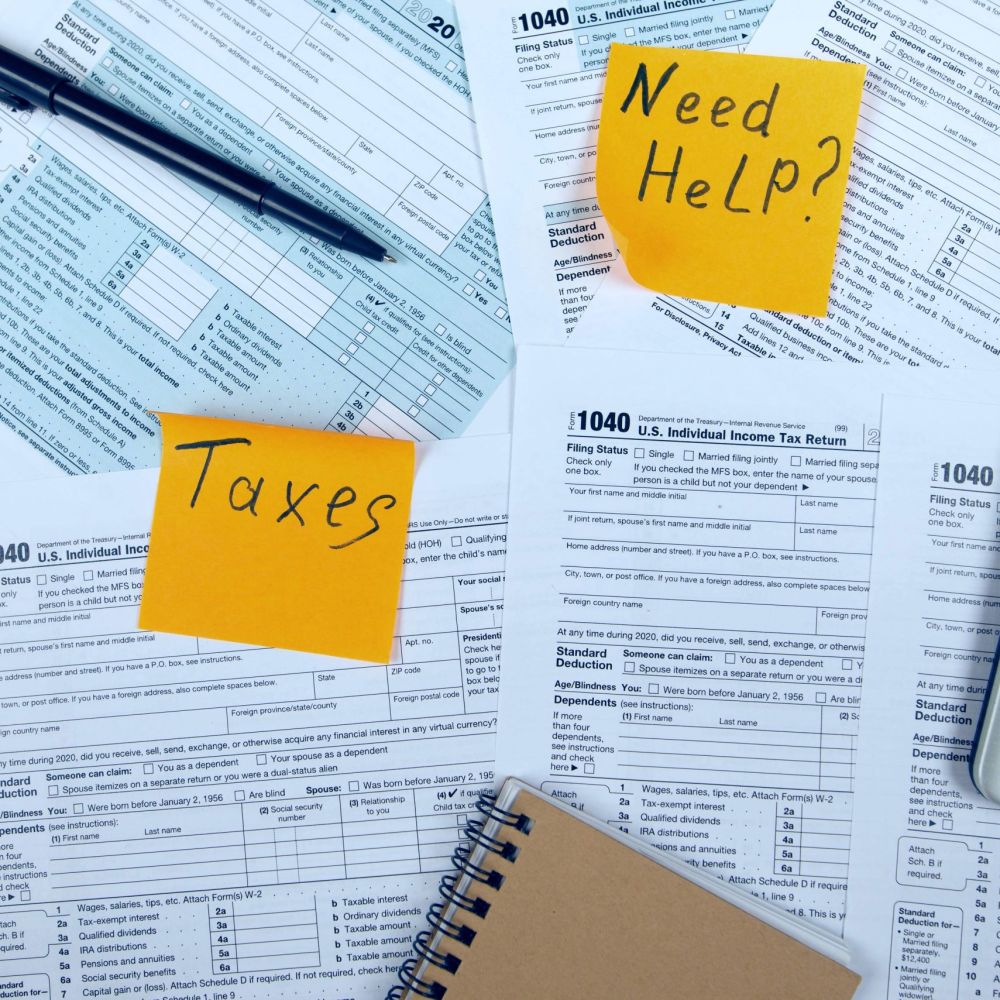 IRS Form 1040 tax documents with need help note highlighting the urgency of applying for IRS Hardship Program relief