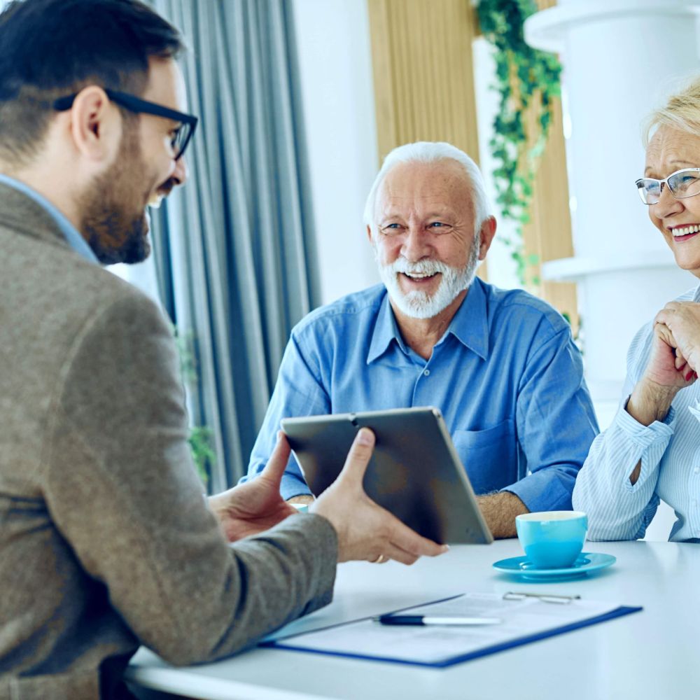 Tax law attorney reviewing IRS Fresh Start Program relief options with senior clients
