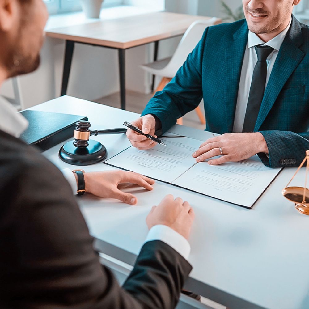 Tax attorney meeting with client in Los Angeles to discuss IRS debt relief